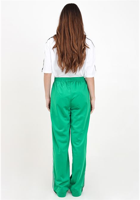 Green women's Track Pants Firebird Loose ADIDAS ORIGINALS | IP0634.